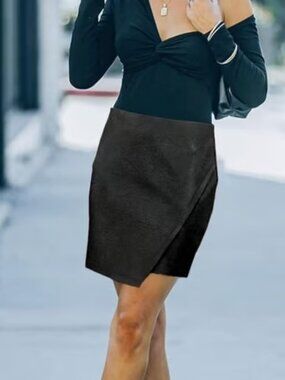 Women’s asymmetrical leather mini skirt
